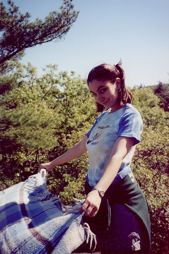 Lea putting down a blanket for our picnic at Mt. Nobscot